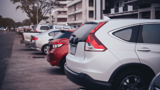 Cars parked along a building