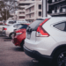 Cars parked along a building