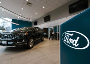 A Ford dealership in East Greenbush, New York, US, on Thursday, Jan. 25, 2024. Ford Motor Co. is scheduled to release earnings figures on February 6. Photographer: Angus Mordant/Bloomberg