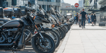 Motorcycles lined up along a curb