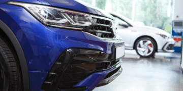 Close up of the front of a car in a dealership