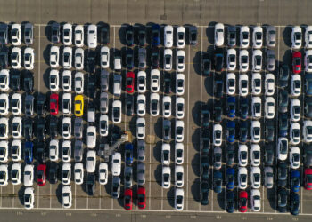 Aerial view of new cars at a seaport storage area in Germany.