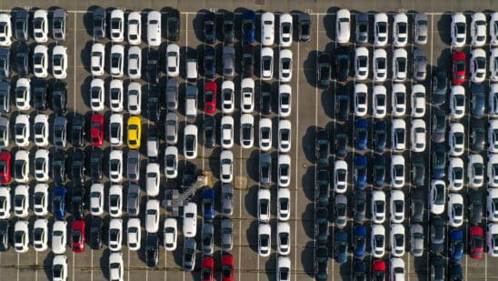 Aerial view of new cars at a seaport storage area in Germany.