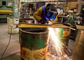 Student Steve Chock uses a plasma welder to cut metal during a class at Hennepin Technical College in Brooklyn Park, MN on Thursday March 8, 2012. Chock is funding his schooling through the G.I. Bill.