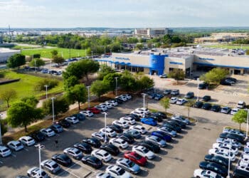 AUSTIN, TEXAS - MARCH 18: In an aerial view, cars sit on the lot at the Howdy Honda dealership on March 18, 2024 in Austin, Texas. Honda Motor and Nissan Motor shares rose significantly after the companies announced a collaboration on electric vehicles. Nissan shares have risen 5.6%, with Honda shares rising 2.7%. The collaboration is an effort to compete with other automakers both in the U.S. and China. (Photo by Brandon Bell/Getty Images)