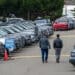 Customers view used Ford vehicles at a dealership in Colma, California, US, on Friday, June 21, 2024. CDK Global, a software provider to some 15,000 car dealers, was waylaid by debilitating cyberattacks this week that have had a crippling effect on the auto sales industry. Photographer: David Paul Morris/Bloomberg
