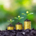 financial growth concept coins and growing plants