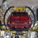 New Fiat Grande Panda EV model automobiles in cradles on the production line at the Stellantis NV manufacturing plant in Kragujevac, Serbia, on Monday, July 22, 2024. Fully electric and hybrid variants of the Grande Panda are planned for Serbian production. Photographer: Oliver Bunic/Bloomberg
