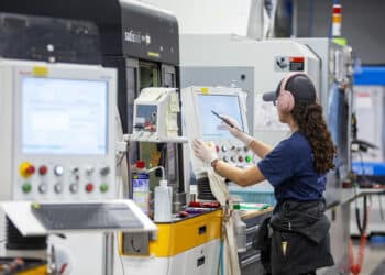An employee works on the production floor at a manufacturing facility in Ontario, New York. Photographer: Lauren Petracca/Bloomberg