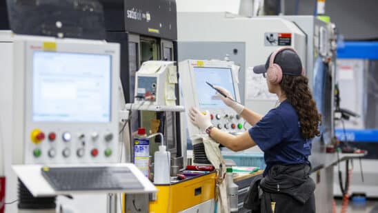 An employee works on the production floor at a manufacturing facility in Ontario, New York. Photographer: Lauren Petracca/Bloomberg