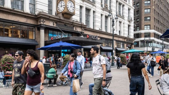 Shoppers in the Herald Square neighborhood of New York. Photographer: Jeenah Moon/Bloomberg