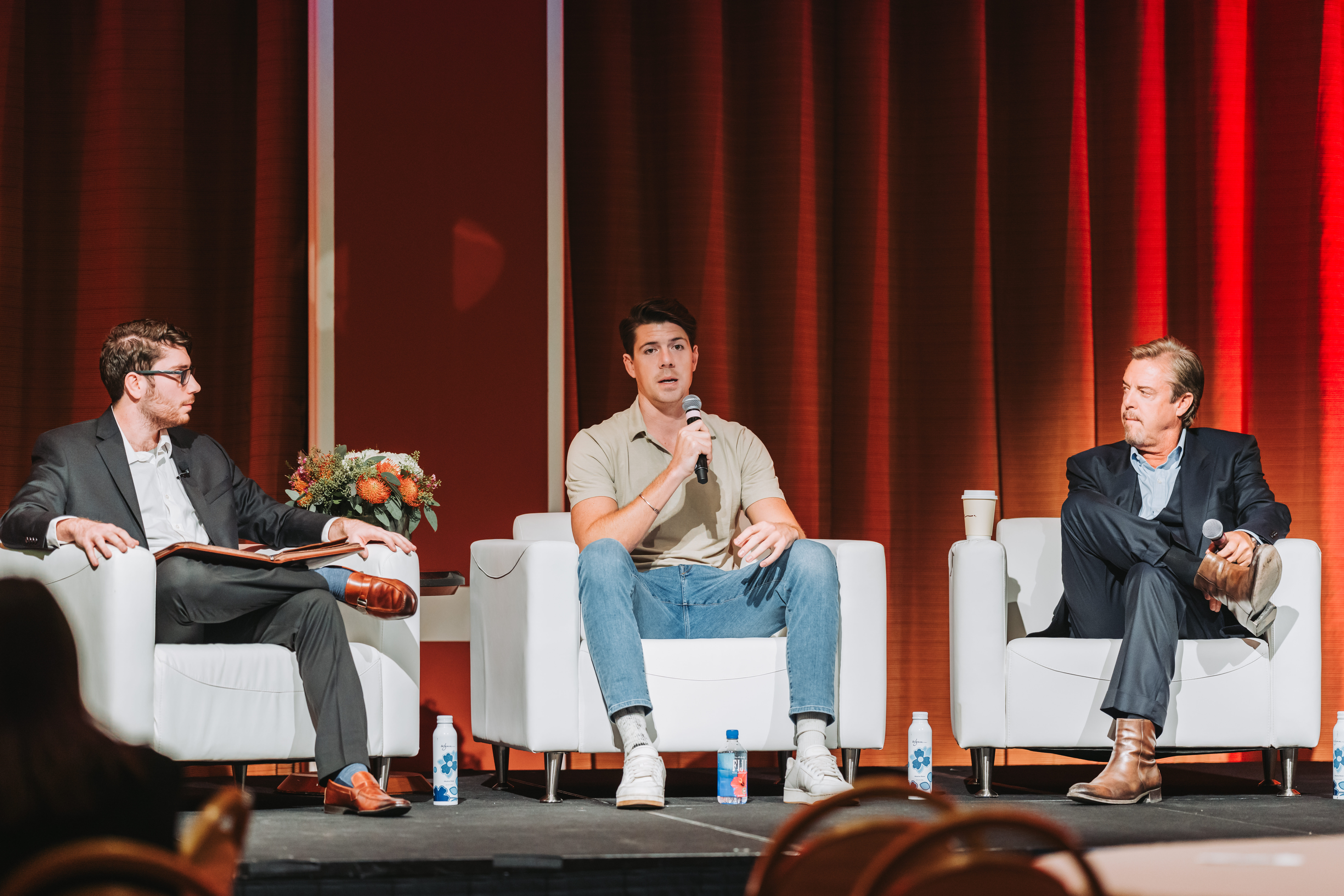 speakers lead a panel discussion at AFS 24