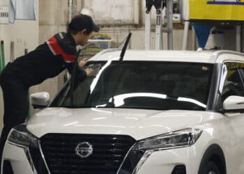 Nissan falls on report of further production cuts, tariffs