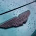 The front badge on an Aston Martin DBX sport utility vehicle (SUV) at the Aston Martin Lagonda Global Holdings Plc factory in St Athan, UK, on Thursday, March 23, 2023. Aston surged after the loss-making manufacturer said itll boost deliveries of lucrative models like the £190,000 ($229,349) DBX707 sport utility vehicle. Photographer: Chris Ratcliffe/Bloomberg
