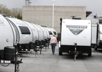 A Winnebago Industries Inc. travel trailer stands at Motor Sportsland RV dealership in Salt Lake City, Utah, U.S., on Monday, April 6, 2020. Amid the coronvirus, government agencies are obtaining RVs to house the homeless and provide housing for medical workers who can not return home in fear of spreading the virus. Photographer: George Frey/Bloomberg