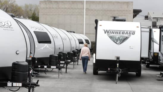 A Winnebago Industries Inc. travel trailer stands at Motor Sportsland RV dealership in Salt Lake City, Utah, U.S., on Monday, April 6, 2020. Amid the coronvirus, government agencies are obtaining RVs to house the homeless and provide housing for medical workers who can not return home in fear of spreading the virus. Photographer: George Frey/Bloomberg