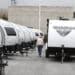 A Winnebago Industries Inc. travel trailer stands at Motor Sportsland RV dealership in Salt Lake City, Utah, U.S., on Monday, April 6, 2020. Amid the coronvirus, government agencies are obtaining RVs to house the homeless and provide housing for medical workers who can not return home in fear of spreading the virus. Photographer: George Frey/Bloomberg