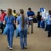 Attendees at a healthcare career fair in Wilmington, North Carolina. Jobless claims lower. Photographer: Allison Joyce/Bloomberg