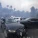 Damaged cars after being bulldozed out of the way to provide access for firefighters. (Photo/Bloomberg)