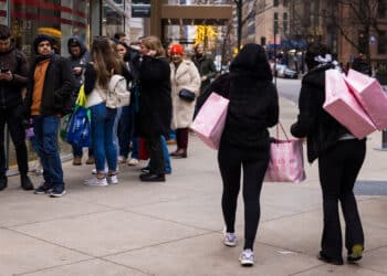 Shoppers carry bags in Chicago, Illinois.