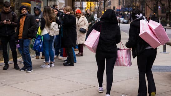 Shoppers carry bags in Chicago, Illinois.