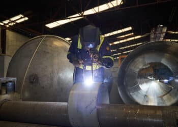 A worker welds a stainless steel part at a steel manufacturing facility in Mexico City, Mexico, on Thursday, Feb. 6, 2025. Uncertainty is taking hold among North American businesses that rely on imports, forcing companies to reassess supply chains and operations.