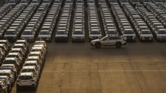 Subaru Corp. vehicles bound for shipment at a port at dusk in Yokohama, Japan, on Thursday, Feb. 6, 2025. In Japan, nominal wages rose at the fastest pace in nearly three decades in December, supporting the Bank of Japans latest rate hike decision and keeping the bank on track for further tightening steps.