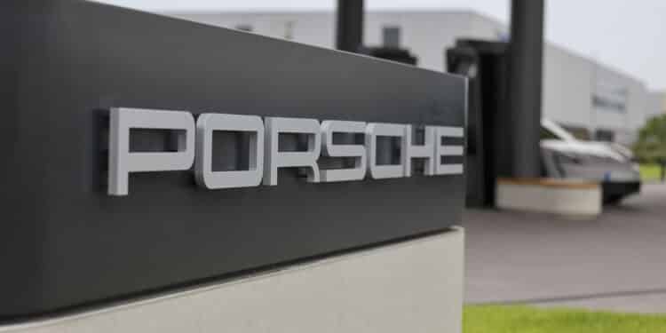 A sign at the Porsche AG first worldwide electric vehicle charging lounge in Bingen, Germany, on Monday, Aug. 28, 2023. The first Porsche Charging Lounge in the world is heated and air-conditioned by a heat pump that operates without fossil fuels, according to their press release. Photographer: Alex Kraus/Bloomberg