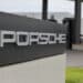 A sign at the Porsche AG first worldwide electric vehicle charging lounge in Bingen, Germany, on Monday, Aug. 28, 2023. The first Porsche Charging Lounge in the world is heated and air-conditioned by a heat pump that operates without fossil fuels, according to their press release. Photographer: Alex Kraus/Bloomberg
