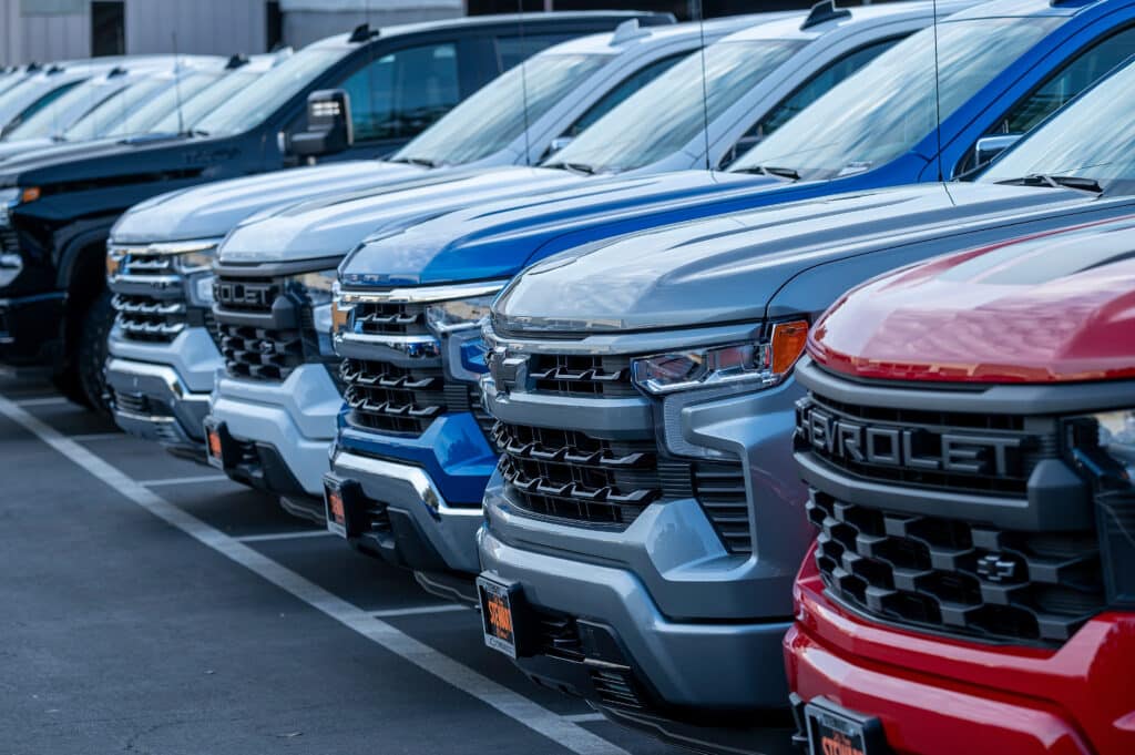 Chevrolet Silverado pick-up trucks at a dealership in Colma, California. Photographer: David Paul Morris/Bloomberg