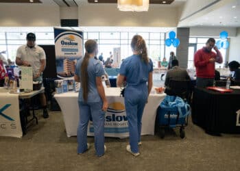 Attendees at a healthcare career fair at Cape Fear Community College in Wilmington, North Carolina.