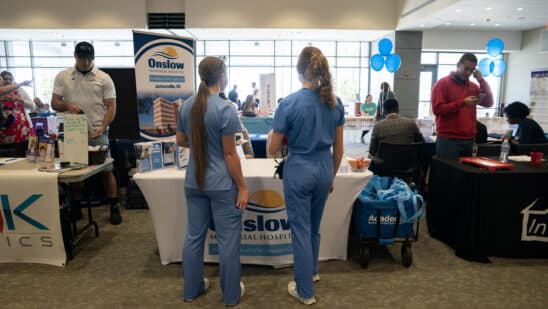 Attendees at a healthcare career fair at Cape Fear Community College in Wilmington, North Carolina.