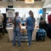 Attendees at a healthcare career fair at Cape Fear Community College in Wilmington, North Carolina.