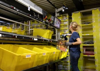 An employee scans an item at a fulfillment center in Robbinsville, New Jersey. Photographer: Bess Adler/Bloomberg