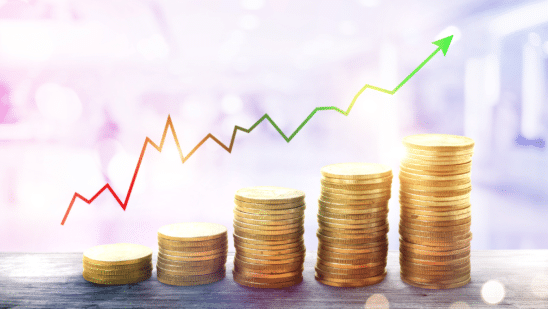 funds growth concept coins stacked higher and higher with arrow up