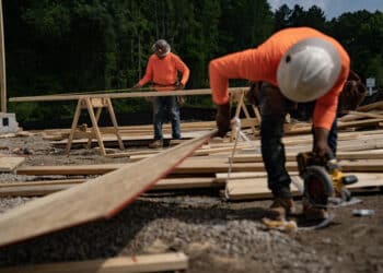 Workers from Herring Homes work at a construction site in Lillington, North Carolina Thursday, June 15, 2023. Photographer: Allison Joyce/ Bloomberg