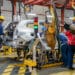 Workers on the production line of the Renault SA Kwid compact vehicle during a launch event at the Renault-Sofasa Envigado Assembly Plant in Medellin, Colombia, Wednesday, April 2, 2025. After a $100 million investment to modernize the Envigado plant, Renault-Sofasa is launching the Kwid, manufactured in Colombia, to meet domestic market demand and export to 15 Latin American countries. Photographer: Edinson Arroyo/Bloomberg