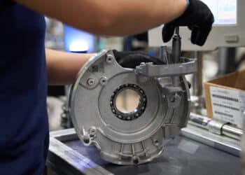 A worker assembles a power-packed Integrated Drive Module (iDM) for Ford Motor Co. Mustang Mach-E all-electric sports utility vehicles (SUV) at the BorgWarner Inc. manufacturing facility in San Luis Potosi, Mexico, on Wednesday, Aug. 25, 202. Markit is scheduled to release manufacturing figures on September 1.