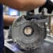 A worker assembles a power-packed Integrated Drive Module (iDM) for Ford Motor Co. Mustang Mach-E all-electric sports utility vehicles (SUV) at the BorgWarner Inc. manufacturing facility in San Luis Potosi, Mexico, on Wednesday, Aug. 25, 202. Markit is scheduled to release manufacturing figures on September 1.