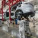 Workers on the assembly line at the Zhejiang Leapmotor Technology Co. production facility in Jinhua, Zhejiang province, China, on Sunday, June 23, 2024. Chinese electric car maker Leapmotor is little known outside its home country, and even there it is overshadowed by bigger players like BYD Co. and Tesla Inc. Photographer: Qilai Shen/Bloomberg