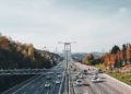cars on road with sky