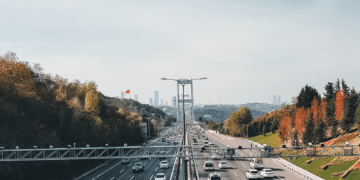 cars on road with sky