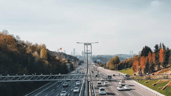 cars on road with sky