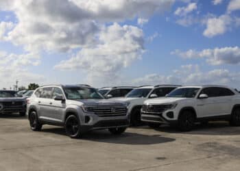 New vehicles displayed for sale at a Volkswagen AG (VW) dealership in Miami, Florida, US, on Saturday, April 5, 2025. Car buyers have been rushing to US showrooms to lock in deals before potential price hikes, and automakers are bracing for significant potential cost increases and supply-chain turmoil, with some companies planning to temporarily halt production or reduce overtime. Photographer: Eva Marie Uzcategui/Bloomberg