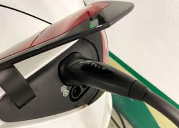 A Tesla Inc. charging cable at a charging point
