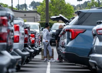 Customers at a car dealership in Richmond, California.