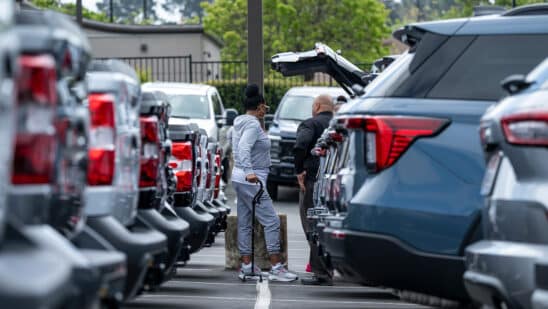 Customers at a car dealership in Richmond, California.