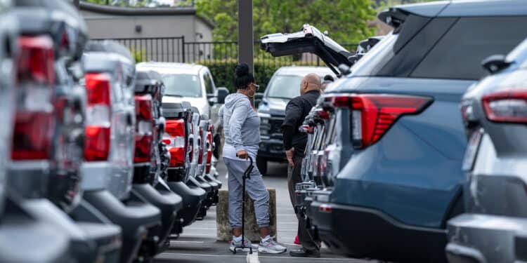 Customers at a car dealership in Richmond, California.
