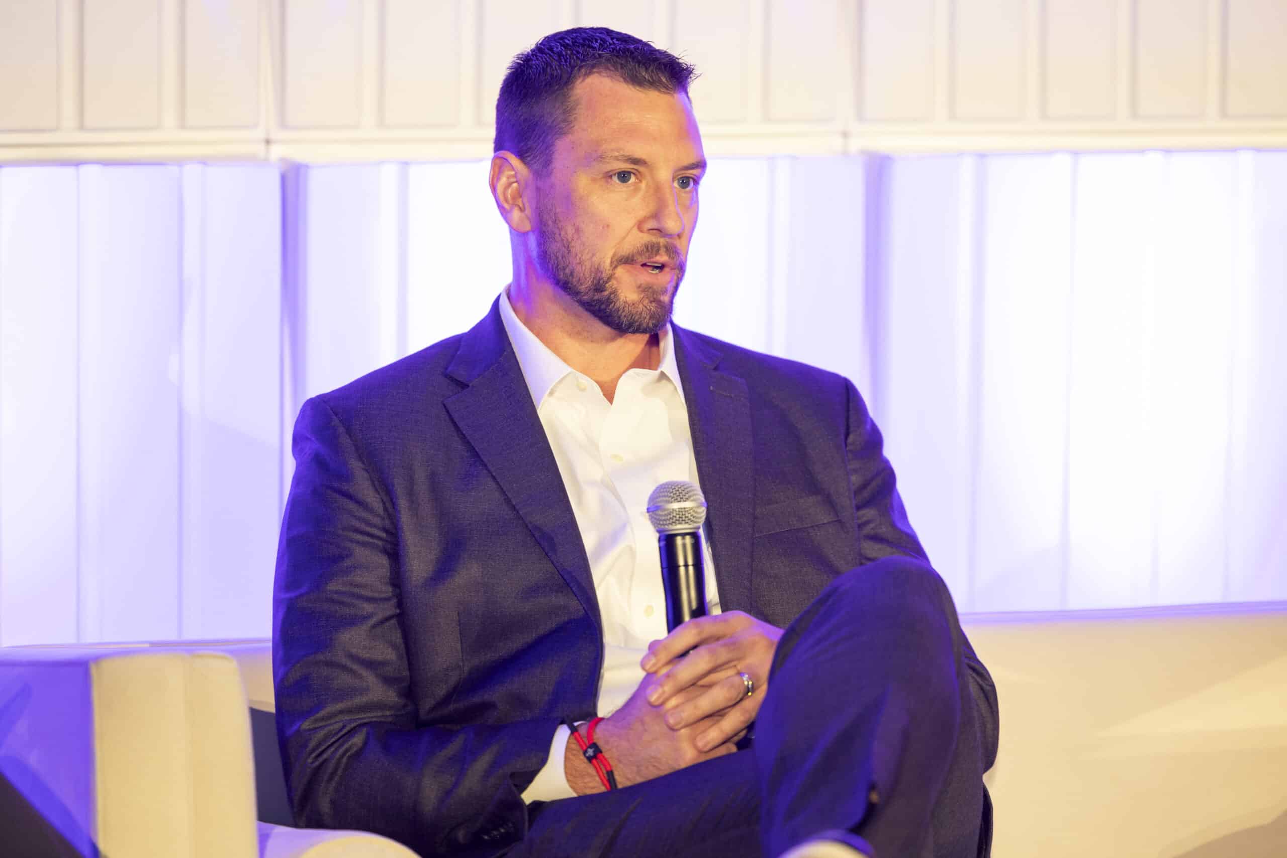 Justin Buzzell, VP of Financial Services at Morgan Automotive Group, speaks at Auto Finance Summit East 2025.
