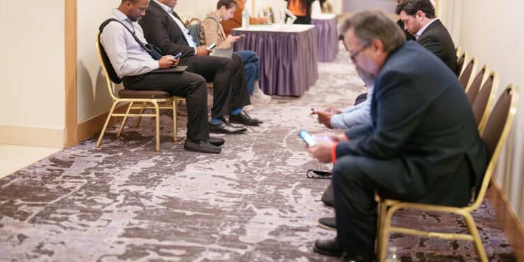 Job seekers attend a job fair in Los Angeles. Photographer: Eric Thayer/Bloomberg